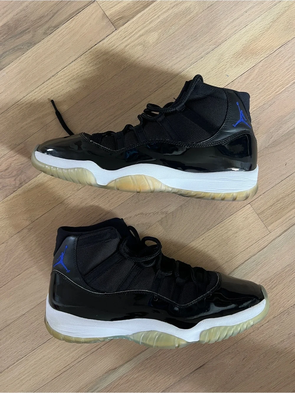 Men’s Air Jordan XI Black Basketball Sneakers with Blue Jumpman (No Box)